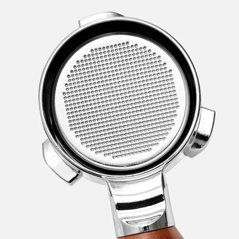 Upgrade your espresso setup with the Breville/Sage 54mm Portafilter. Designed for precision and durability, this stainless steel portafilter is compatible with 54mm Breville and Sage espresso machines. Its ergonomic handle ensures a comfortable grip, while the high-quality filter basket promotes even extraction for a rich, full-bodied espresso. Perfect for home baristas looking to achieve café-quality results. Shop now and enhance your coffee experience!