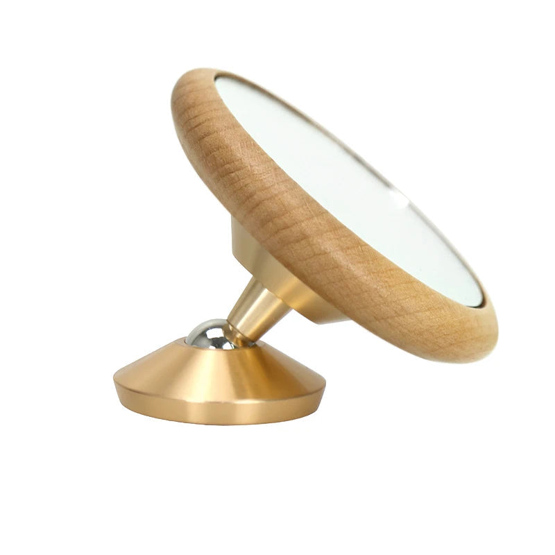 Wooden and gold circular object on a white background