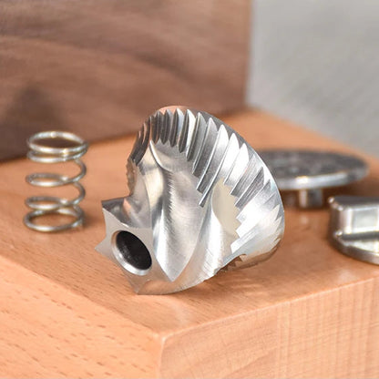 Full stainless steel conical burr on a wooden surface with text highlighting its features.